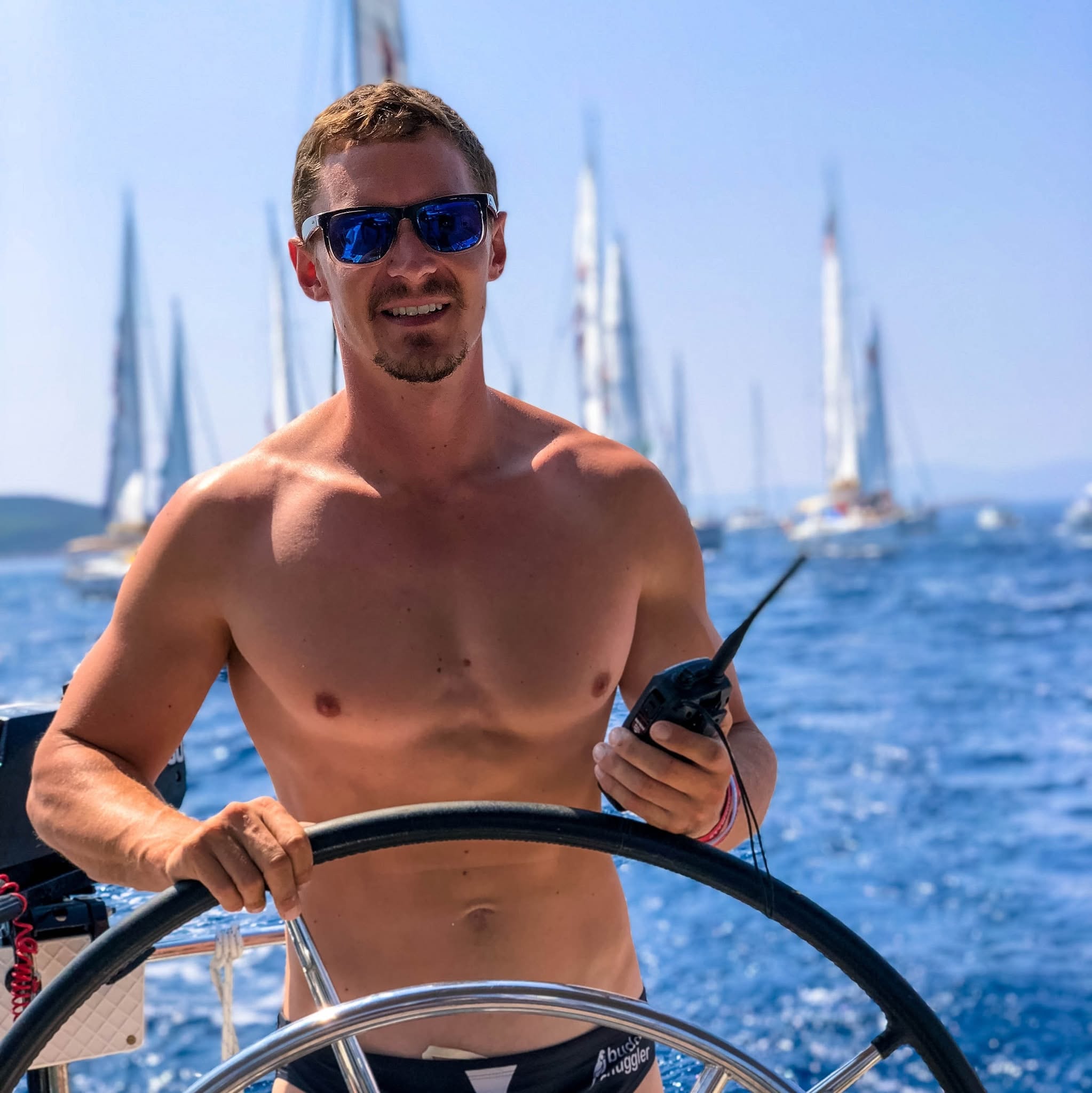 Matt Dawe sailing at the helm